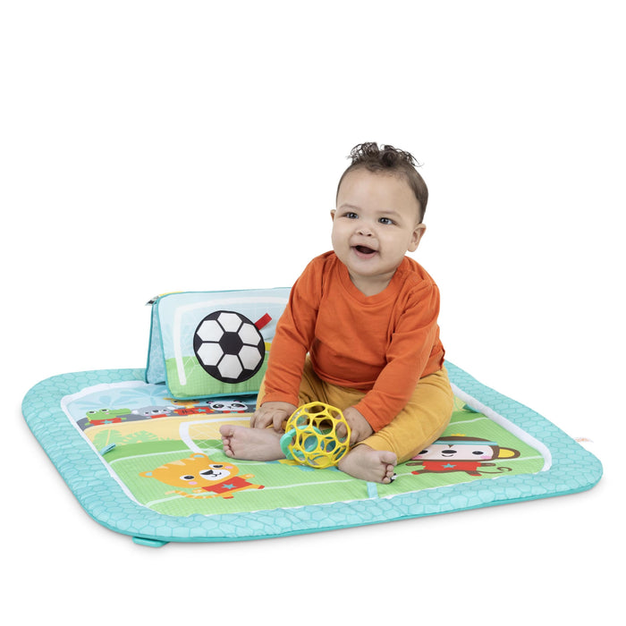 Bright Starts, Palestra Attività a Tema Calcio Oball, 4 Modalità di Gioco: Tappetino Lavabile con Cuscino per Pancia, Arco Removibile, Luci e 30+ Melodie, Unisex, 0+ Mesi