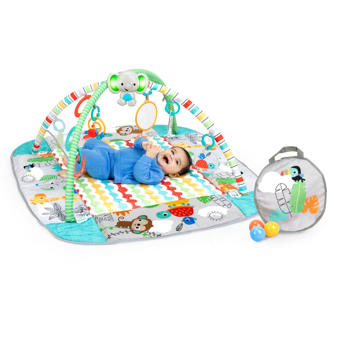 Bright Starts, Palestra di Attività Evolutiva 5in1 - 40 palline, Arco di Gioco, 7 Giocattoli Rimovibili, 20+ Min di Luci e musica, Sviluppo Motorio, da neonato a bambino - Totally Tropical