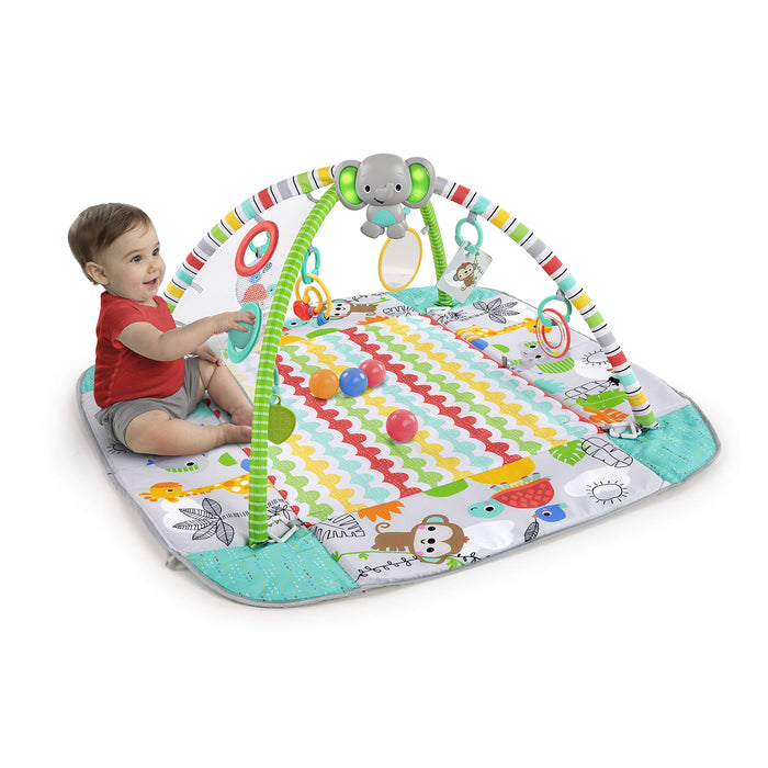 Bright Starts, Palestra di Attività Evolutiva 5in1 - 40 palline, Arco di Gioco, 7 Giocattoli Rimovibili, 20+ Min di Luci e musica, Sviluppo Motorio, da neonato a bambino - Totally Tropical
